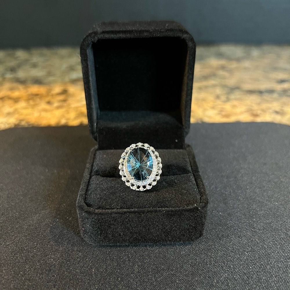 Blue Egg Shaped Gem & Diamond / Stainless Steel Fashion Ring Sizes: 6-8